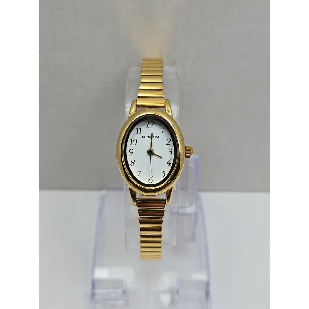 Bofan Womens Gold Tone Oval Easy Reader Stretch Band Quartz Watch New Battery